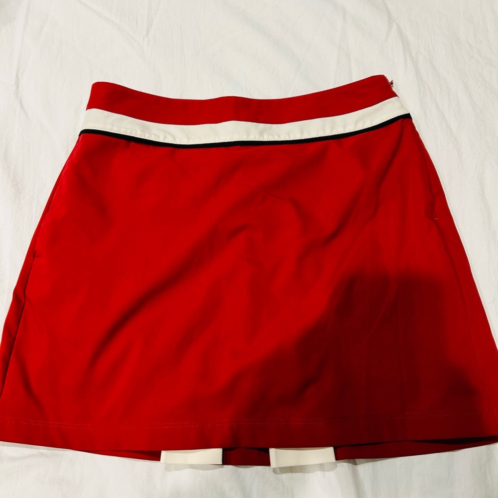 Izod Women’s Golf Skort with cute pleated back.